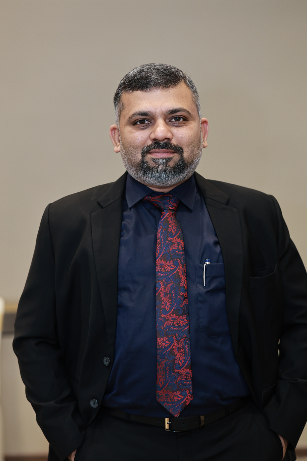 Headshot of Abdul Riaz – President, Client Relations